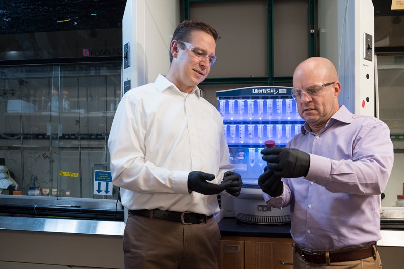 Chris Kloxin and Darrin Pochan in the lab.